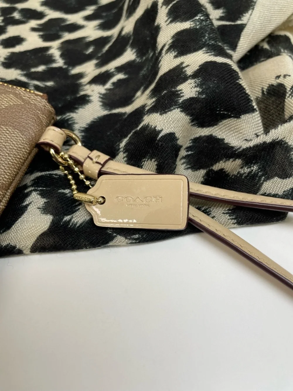 Coach Signature Zip Wristlet in Brown and Cream